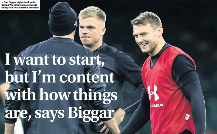  ??  ?? &gt; Dan Biggar (right) is all smiles during Wales training, alongside his fly-half rival Gareth Anscombe
