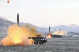 ?? KRT / VIA ASSOCIATED PRESS ?? North Korea launches four missiles from an undisclose­d location in this image taken from video by KRT, Pyongyang’s state-run television station. North Korea said the move was a drill for striking U.S. bases in Japan.