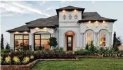  ??  ?? The Juniper model home is in Cinco Ranch in The Enclave at Ridgefield Heights.