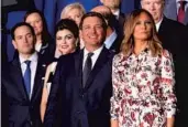  ?? JIM WATSON/GETTY-AFP ?? The first lady stands with Gov. Ron DeSantis, center, and U.S. Sen. Marco Rubio, R-Fla., left, as the president addresses the Venezuelan-American community.