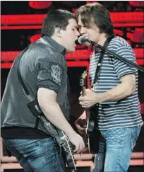  ??  ?? Eddie Van Halen (right) – playing with son Wolfgang Van Halen in New York City last week – is elevated by his virtuosity and the inside-out knowledge of his instrument.