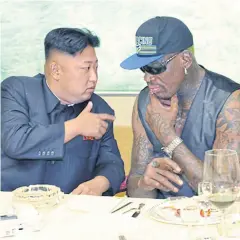  ?? AP/RODONG SINMUN ?? North Korean leader Kim Jong-Un talks with former NBA player Dennis Rodman during a dinner in North Korea in 2013.