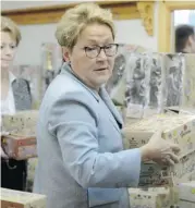  ?? CANADIAN PRESS FILES ?? Parti Québécois Leader Pauline Marois helps organize boxes of Easter chocolates at a daycare fundraiser March 25 in Ste-Anne-des-Plaines.