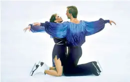  ?? ?? History makers: Jayne Torvill and Christophe­r Dean (right) dance to Bolero on a mountain lake in Alaska last year, and (below) on their way to Olympic gold in 1984