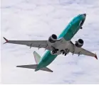  ?? Associated Press photos ?? RIGHT:
A Boeing 737 MAX 8 jetliner being built
for Turkish Airlines takes off on a test flight on May 8 in Renton,
Wash.