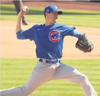  ?? JOHN ANTONOFF/SUN-TIMES ?? Kyle Hendricks (above) and Marcus Stroman want each other to have the Opening Day job.