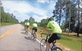  ?? Olivia Morley ?? Paul Anderson Youth Home residents prepare for their 300-mile biking trip in South Georgia.