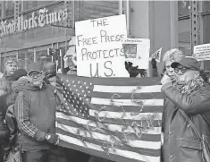  ?? KATHY WILLENS, AP ?? A protest in front of The New York Times building on Feb. 26.