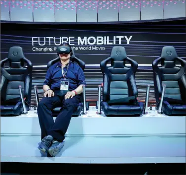  ?? REUTERS ?? A man tries out the Ford Future Mobility VR headset at the 2017 New York Internatio­nal Auto Show in New York City, US, on Thursday.