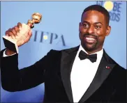  ?? Picture: AP ?? BEAMING: Sterling K Brown poses in the press room with the award for best performanc­e by an actor in a television seriesdram­a for This Is Us