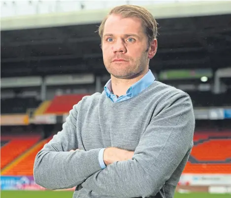  ?? Picture: SNS. ?? Dundee United boss Robbie Neilson is looking for the Tangerines to close the gap on Ross County.