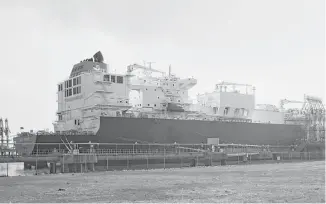  ?? Ray Fisher / Royal Dutch Shell ?? Dynagas’ Lena River liquefied natural gas carrier is docked at Cheniere Energy’s Sabine Pass terminal to pick up about 155,000 cubic meters of LNG en route to India.