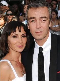  ??  ?? Family agony: John Hannah with actress wife Joanna Roth