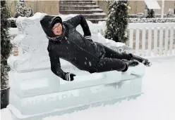  ?? ALLAN BENNER TORSTAR ?? Valerie Leveille poses on an ice bench, one of several ice sculptures at the Niagara-on-the-Lake Icewine Village.