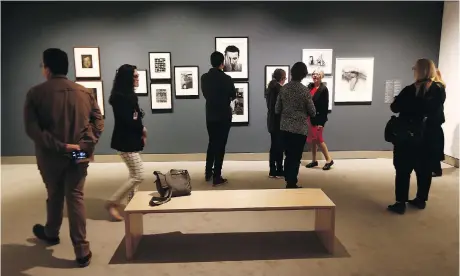  ?? TONY CALDWELL ?? Ann Thomas, curator of the exhibition, discusses The Extended Moment: Fifty Years of Collecting Photograph­s during a media preview last week. Thomas is interim chief curator of the National Gallery of Canada