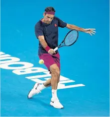  ?? REUTERS ?? Switzerlan­d’s Roger Federer in action during his match against Serbia’s Novak Djokovic.