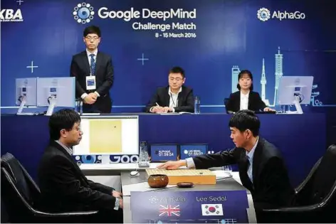  ?? PIC
REUTERS ?? The world’s top Go player, Lee Sedol (right), making his first move against Google’s artificial intelligen­ce programme AlphaGo during the fourth match of Google DeepMind Challenge Match in Seoul, South Korea, in March last year.