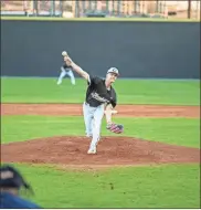  ?? Tim Godbee ?? A Calhoun pitcher fires a pitch towards home plate in the team’s 5-4 loss last Friday to Cherokee High School.