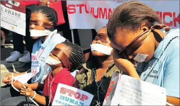  ?? Picture: BRENDAN MAGAAR ?? TAKING A STAND: People from the Catholic Church march to Parliament to protest against human traffickin­g.