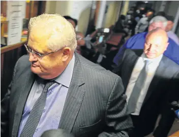  ?? Pictures: ALAISTER RUSSELL ?? BAIL GRANTED: Former Bosasa chief operations officer Angelo Agrizzi leads Frans Voster and Andries van Tonder into the specialise­d commercial crimes court in Pretoria on Wednesday after their arrests.