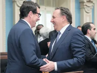  ?? JACQUES BOISSINOT/THE CANADIAN PRESS ?? “The uncertaint­y created by Mr. Péladeau does not help attract business investment­s,” says Coalition Avenir Québec Leader François Legault, right.