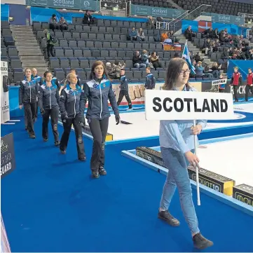  ??  ?? FLYING THE FLAG: Eve and team-mates are led out at the opening ceremony of the European Championsh­ips at Braehead Arena, Glasgow, in 2016.