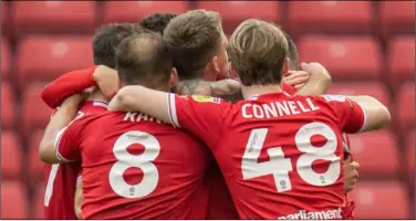  ?? ?? Goals: Barnsley celebrate Devante Cole’s winner, above, and Josh Martin doubles the lead, below. Left: Daniel Stendel at half-time. Pictures: News Images.