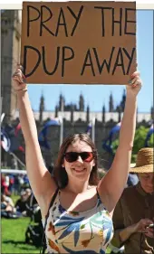  ??  ?? NO DEAL: A woman protester in London