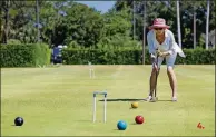  ?? ALLEN EYESTONE / THE PALM BEACH POST ?? Learn the game of croquet for free on Saturday at the National Croquet Center in West Palm Beach.