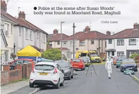  ?? Colin Lane ?? Police at the scene after Susan Woods’ body was found in Moorland Road, Maghull