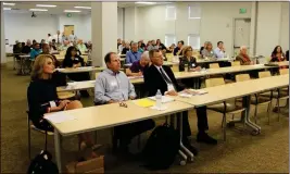  ?? PHOTO COURTESY OF CITY OF SAN LUIS, ARIZ. ?? SOUTHWEST ARIZONA TOWN HALL steering committee members Shelley Mellon (from left), Frank West and Wayne Benesch listen to panelists describe innovative programs adopted in Yuma County to address criminal justice issues.