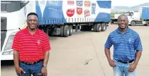  ?? Picture: Supplied ?? Truck driver Simon Mkhatshwa, left, and sugar logistics executive Lazarus Bereda, both of RCL Foods in Mpumalanga.