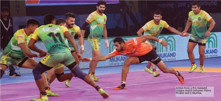  ??  ?? Action from a Pro Kabaddi League match between Patna Pirates and U Mumba.