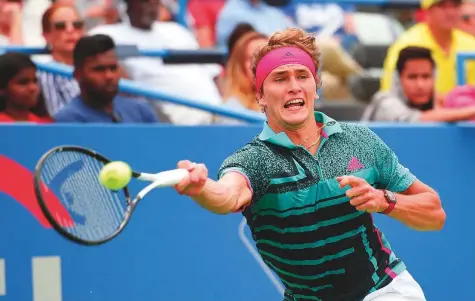  ?? AP ?? Alexander Zverev returns a forehand against Kei Nishikori during the Citi Open tournament at Rock Creek Park Tennis Center in Washington on Friday. The German won 3-6, 6-1, 6-4.