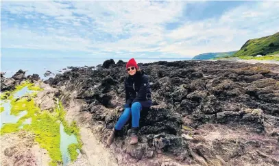  ??  ?? ROCKS ‘N’ ROLL Annie prefers serene Dunaverty Bay to the stress of the airport and budget flights to foreign climes