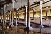  ?? Melissa Phillip / Houston Chronicle ?? The Buffalo Bayou Park Cistern, built in 1926 to hold drinking water, contains hundreds of columns.