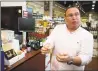  ??  ?? Angelo Martelli, director of wines at Fairway Market, discusses the supermarke­t's new cork recycling initiative.