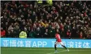  ??  ?? Marcus Rashford celebrates after his header went in off Tom Heaton. Photograph: Tom Purslow/Manchester United via Getty Images