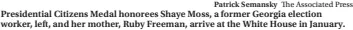 ?? Patrick Semansky The Associated Press ?? Presidenti­al Citizens Medal honorees Shaye Moss, a former Georgia election worker, left, and her mother, Ruby Freeman, arrive at the White House in January.