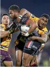  ?? GETTY IMAGES ?? Manu Vatuvei is tackled by Broncos’ Tevita Pangai Junior at Mt Smart Stadium yesterday.