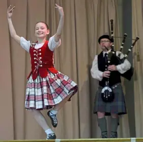  ?? Pittsburgh Post-Gazette ?? A dancer with Thompson Highlander­s performs a traditiona­l Scottish dance during Pittsburgh Tartan Day at the Bethel Presbyteri­an Church in 2019.