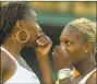  ?? Alastair Grant / Associated Press ?? Venus Williams, left, with her sister Serena, talk during a 2002 women’s doubles match at Wilmbledon.