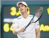  ?? CLIVE BRUNSKILL/GETTY IMAGES ?? Defending champion Andy Murray of Great Britain reacts during his 5-set loss in Wednesday’s quarterfin­al.