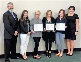  ??  ?? Three members of the Catoosa County community recently graduated from the Georgia Academy for Economic Developmen­t. From left: Patrick Vickers, Georgia Department of Community Affairs; Carrie Barnes, Georgia EMC; graduate Cindie Patty, owner of...