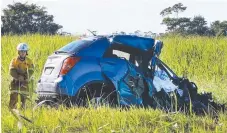  ??  ?? A car and a truck (right) collided in a head-on crash at Tumbulgum yesterday, claiming the life of the car driver. Pictures: SCOTT POWICK