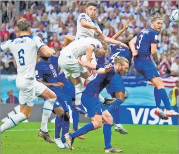  ?? AP ?? England's Harry Kane (C) misses a chance during the World Cup group B match against USA at the Al Bayt Stadium in Al Khor .