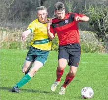  ?? Pictures: Tracey Corps ?? Ashford United 3rds take on Smeeth & Brabourne (red) in Division 3 on Sunday