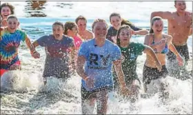  ?? PHOTO BY DON CARRICK, STUDIO 413 ?? Participan­ts from the 2016 Polar Plunge event.