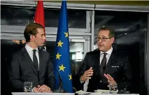  ?? PHOTO: GETTY IMAGES ?? The People’s Party leader Sebastian Kurz, left, and Freedom Party leader HeinzChris­tian Strache announce the details of their coaltion deal.