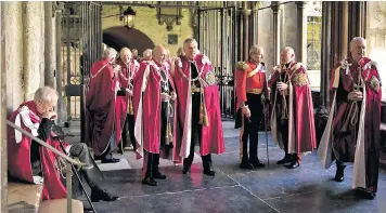  ??  ?? Sir Derek Oulton, below, and, seated left, with other knights before the Order of the Bath service at Westminste­r Abbey in 2014